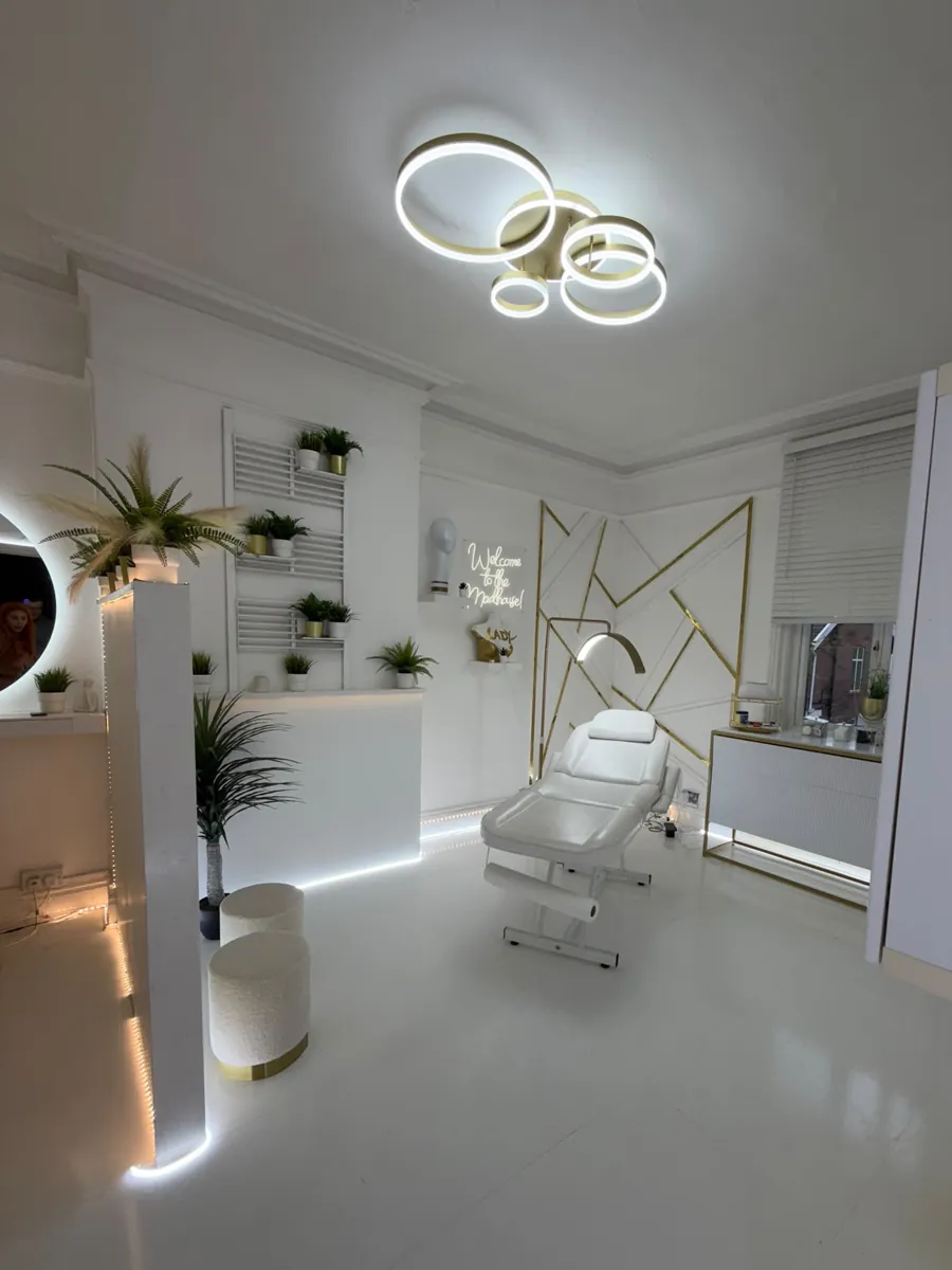 The treatment room with gold ring lighting